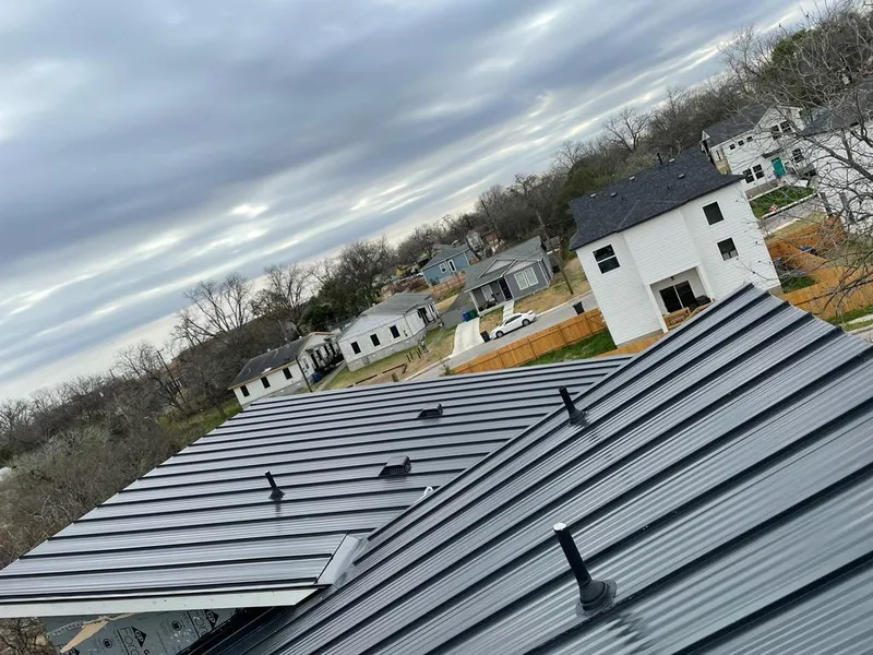 Standing seam metal roof panels with vents for Skylight Repair in Chippewa Falls